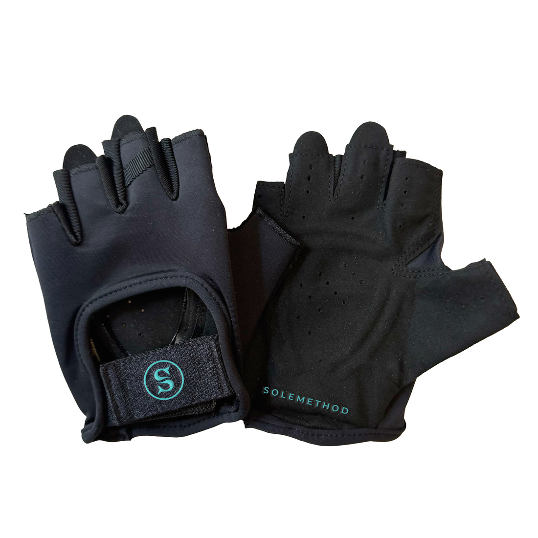 SIREN Grip Gloves in Abyss, a black fingerless glove with a black palm and a black wrist strap featuring the circular SOLEMETHOD S logo in teal.