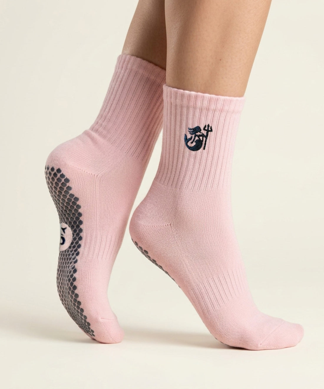 SIREN Warrior Grip Sock in Seashell, worn on feet.