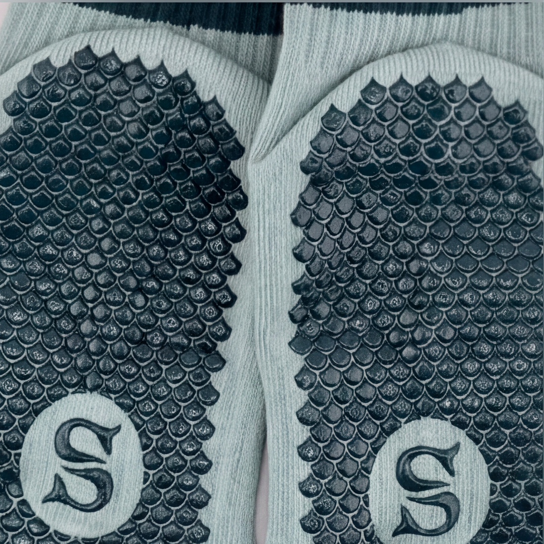 Close-up of the SIREN Seafoam Grip Sock showing the Mermaid Sole grip texture on the sole.
